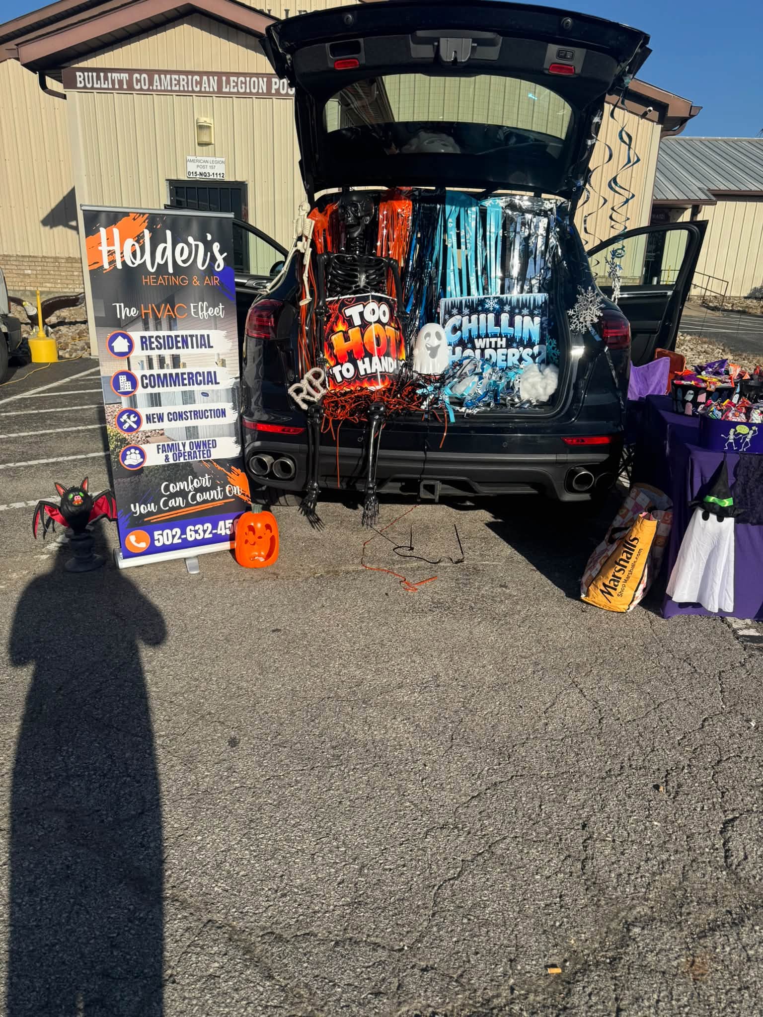 Holder's Heating & Air community event display with company branding
